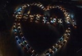 Ко Дню города автовладельцы Череповца выстроили из машин фигуру сердца с названием любимого города