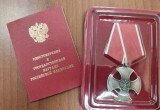 Родителям погибшего вологжанина передали посмертную награду сына