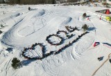 50 снегоходов выстроились в логотип Года семьи на фестивале в Кириллове